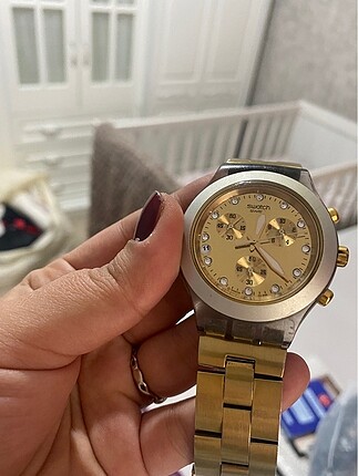 Swatch sarı kol saati