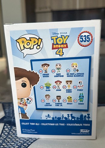 Beden Funko pop sheriff woody holding forky