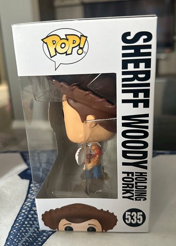 Funko pop sheriff woody holding forky