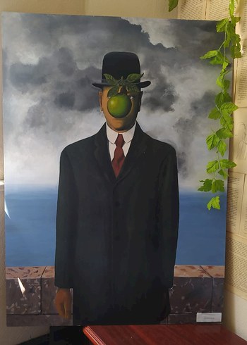 Rene Magritte Adamın Oğlu adlı akrilik çalışma