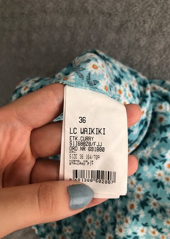 LC Waikiki Çiçek Desenli Mini Şort Etek