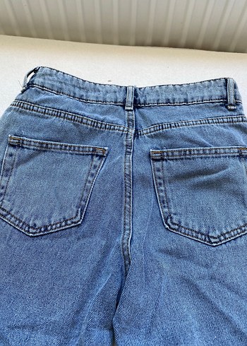 26 Beden Kalp detaylı kot pantolon