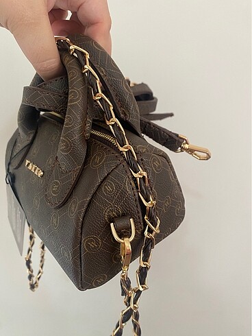  Beden Vakko zincirli mini speedy çanta