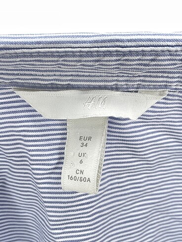 34 Beden mavi Renk H&M Gömlek %70 İndirimli.