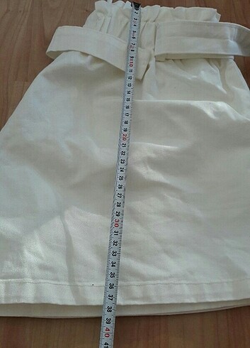 xl Beden L XL uyumlu ekru renk kisa sort yanda iki cebi mevcut