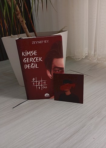 Kimse gerçek değil"adlı roman - Görsel 2