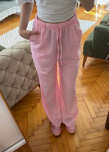 Pembe Keten Bol Kesim Piliseli Pantolon