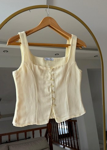 Stradivarius Düğmeli Kolsuz Keten sarı Mini Bluz
