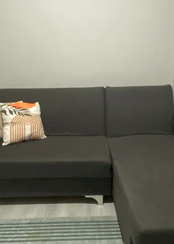 Gri L koltuk ve puf oturma grubu