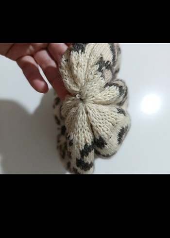 leopar desenli örme bir beredir.esnek bir yapıya sahiptir - Görsel 4