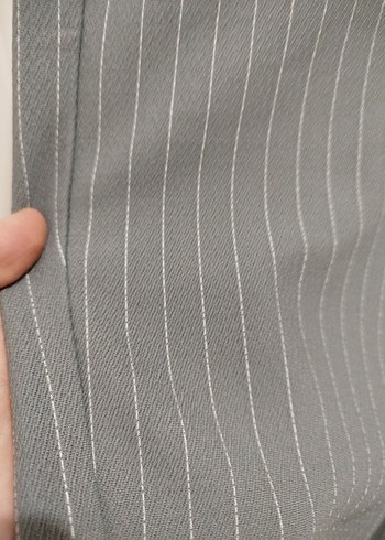 likralıdır yenidir
Gri Çizgili Piliseli Kadın Kumaş Pantolon - Görsel 2