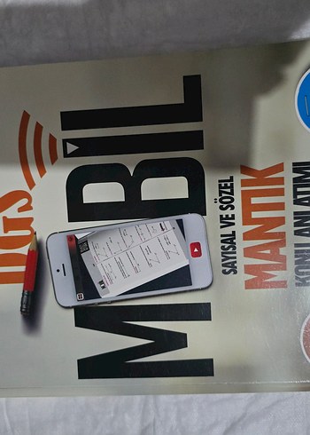 Beyaz iPhone ve Matematik Kitabı