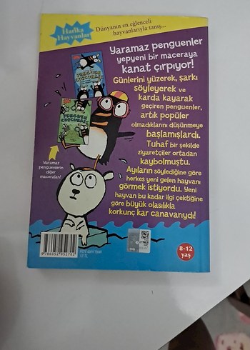 Penguen Curcunası ve yanında ingilizce bir kitap - Görsel 2