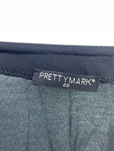 40 Beden siyah Renk PreLoved Bluz %70 İndirimli.