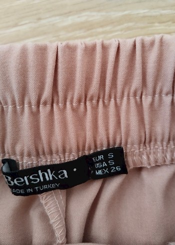 36 Beden pudra rengi beli lastikli kumaş şort