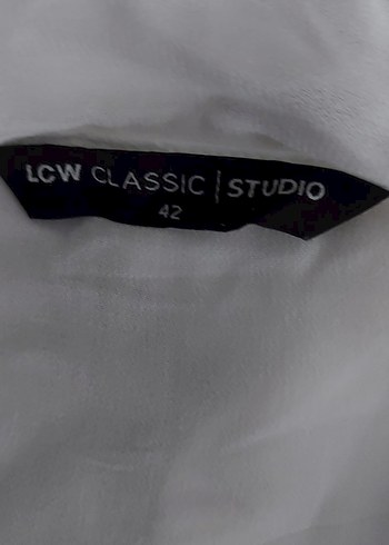 Beyaz Dökümlü kumaştan V Yakalı Salaş Kadın Bluz - Görsel 5