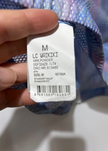 Şeffaf Pastel Mavi Batik Desenli Kadın Yağmurluk - Görsel 4