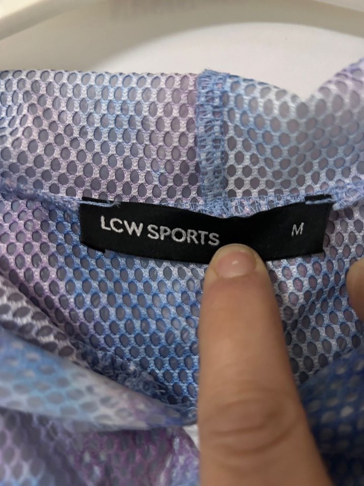 Şeffaf Pastel Mavi Batik Desenli Kadın Yağmurluk - Görsel 2