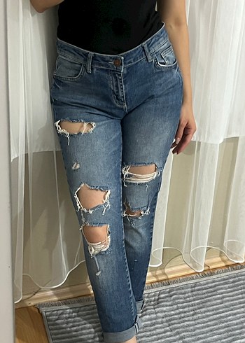 Yırtık Detaylı Mavi Midi Boy Kadın Jean