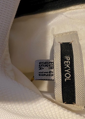 İpekyol marka Beyaz Üst ve Siyah Pileli Midi Etek - Görsel 4