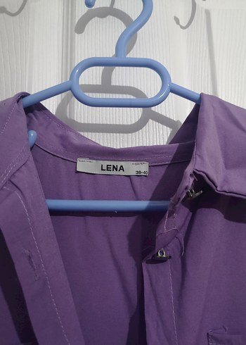 Terikoton kumaş, önü cepli,yarım düğmeli,beli büzgülü
Boy:125 cm - Görsel 2