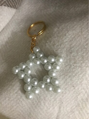 İncili charm