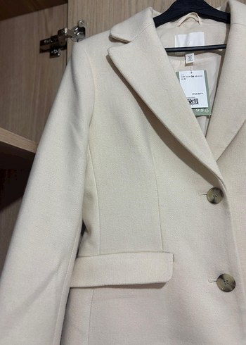 Single-breasted coat
Düğmeli Krem Rengi Kaban - Görsel 6
