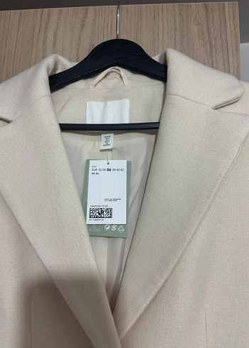 Single-breasted coat
Düğmeli Krem Rengi Kaban - Görsel 4