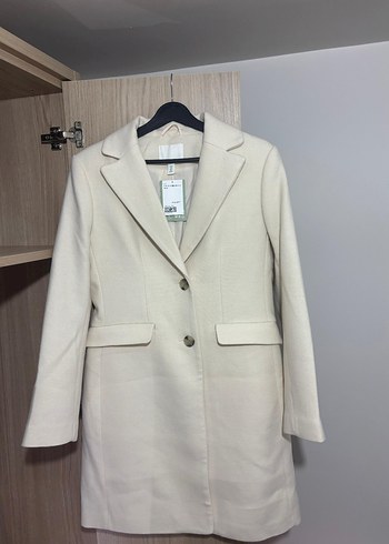 Single-breasted coat
Düğmeli Krem Rengi Kaban - Görsel 5