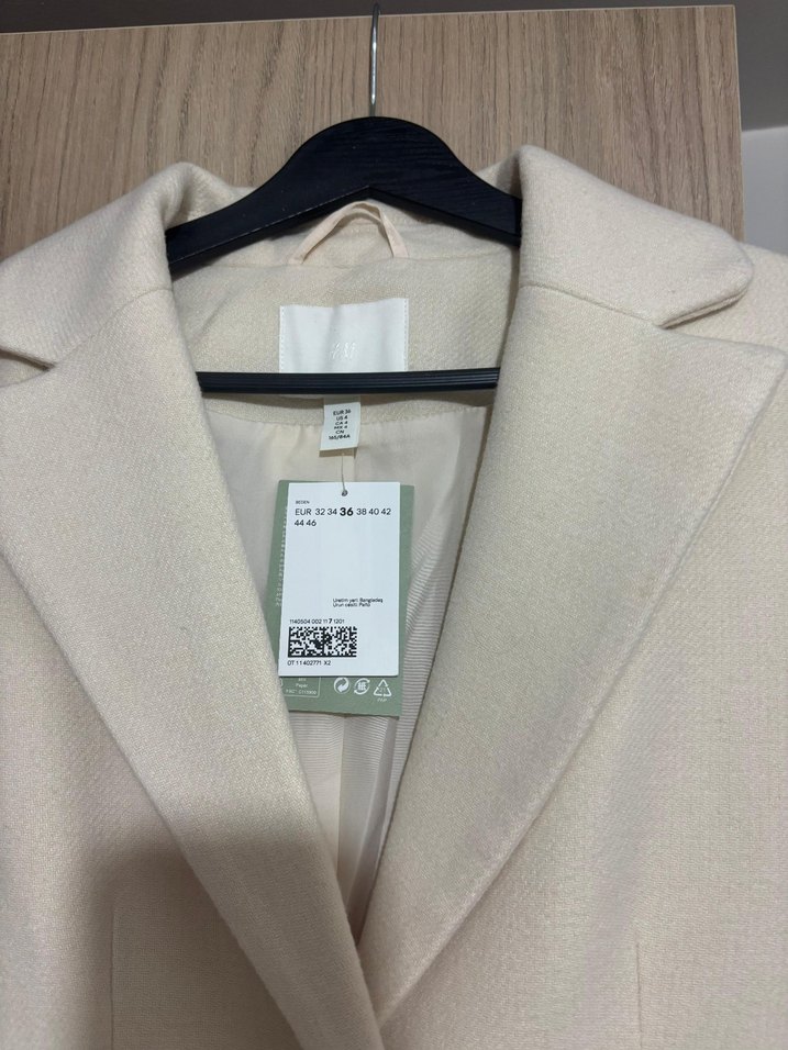 Single-breasted coat
Düğmeli Krem Rengi Kaban - Görsel 4
