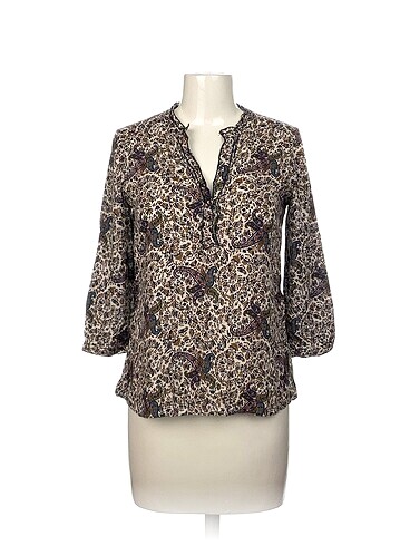 Zara Bluz %70 İndirimli.