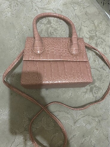Toz pembe rugan çanta