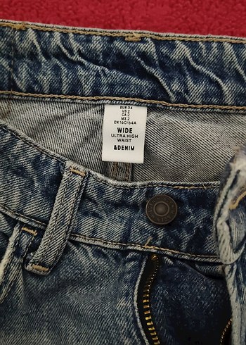 Beyaz, bol kesim, yırtmaçlı midi kot pantolon - Görsel 2