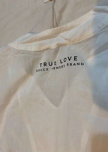 Beyaz V Yakalı Kolsuz Kadın Bluz - Görsel 3