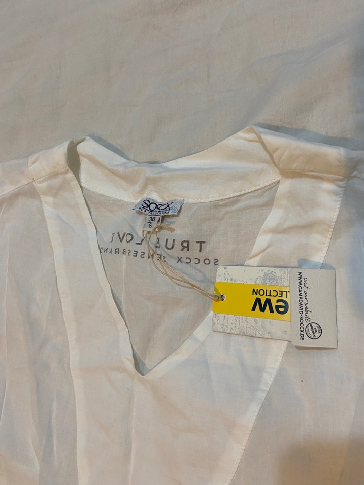 Beyaz V Yakalı Kolsuz Kadın Bluz - Görsel 2