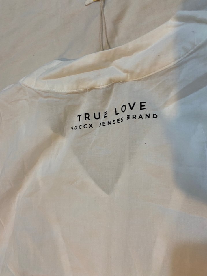 Beyaz V Yakalı Kolsuz Kadın Bluz - Görsel 3