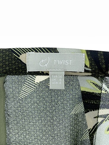 36 Beden çeşitli Renk Twist Mini Şort %70 İndirimli.
