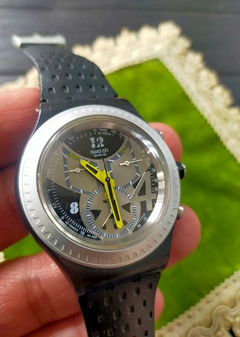 Swatch Siyah Capraz Delikli Spor Kol Saati