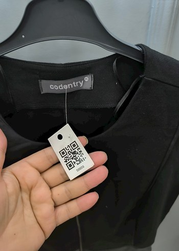 ADL markaya ait Siyah Fermuarlı Midi V Yaka Kolsuz Elbise - Görsel 8