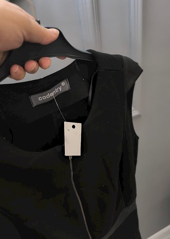 ADL markaya ait Siyah Fermuarlı Midi V Yaka Kolsuz Elbise - Görsel 7