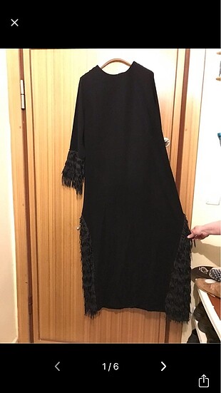 Siyah puskullu elbise
