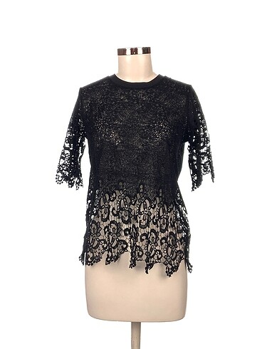 Zara Bluz %70 İndirimli.