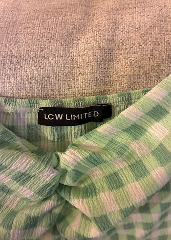 Yeşil Ekoseli Kalp Yaka Dizboyu
Elbise - Görsel 2