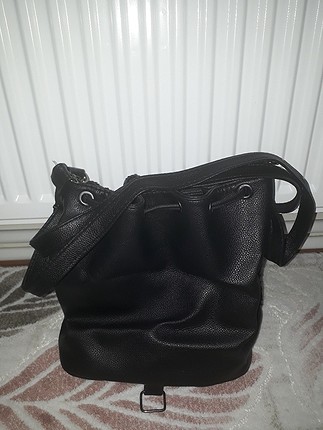 Koton pullu kol çantası