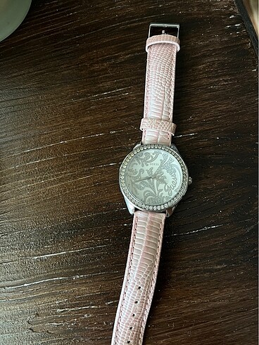 Guess Saat