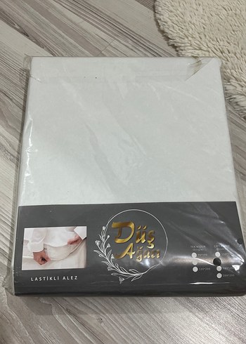 Beyaz Parlak Baskılı Sıvı Geçirmez Yatak Çarşafı - Görsel 2