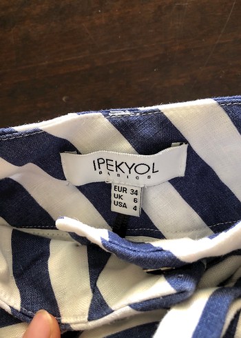 34 Beden Kadın Mavi Çizgili Kısa Pilili Şort