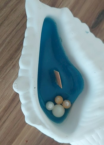 Mavi Deniz Kabuğu içinde mum