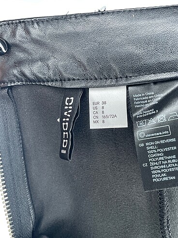 38 Beden siyah Renk H&M Mini Etek %70 İndirimli.