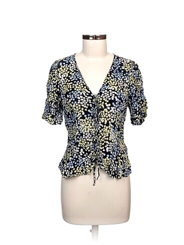 H&M Bluz %70 İndirimli.